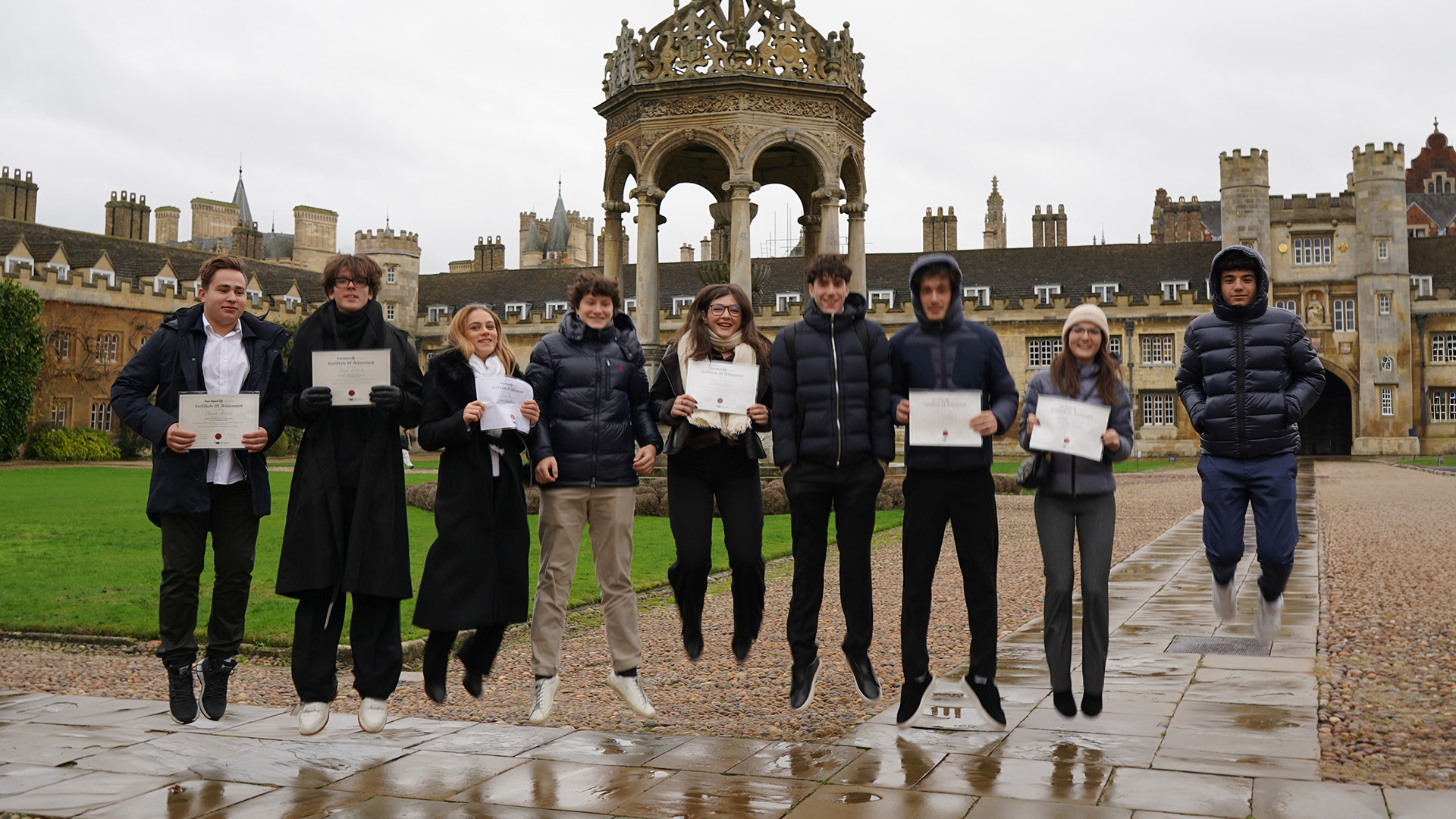 Teen teachers celebrating with their certificates