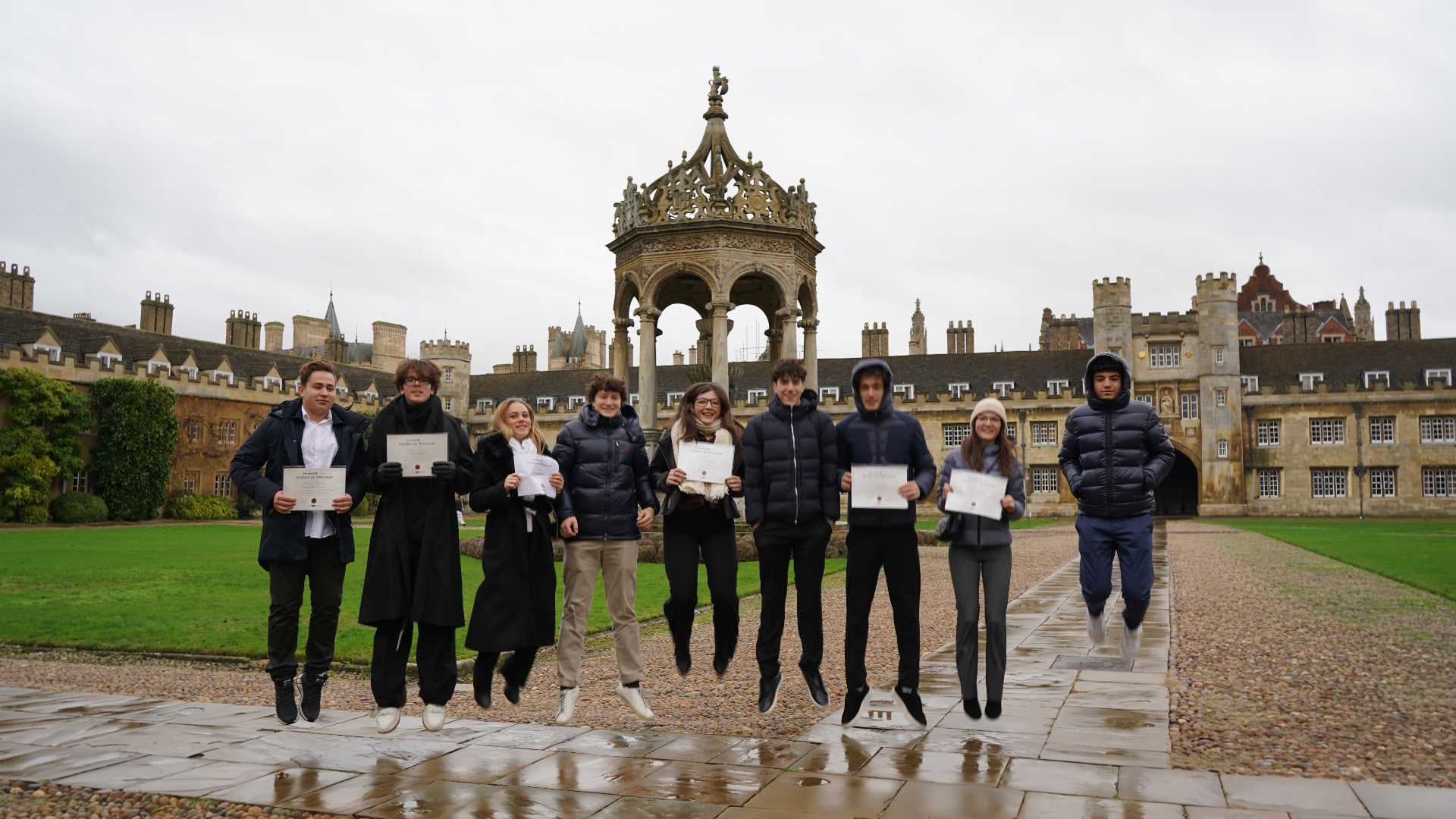 Teen teachers and students celebrating their Cambridge English certificates at Trinity College